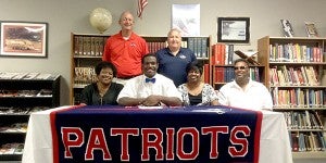 Tamaris Jamison signed a scholarship Tuesday to play football with Faulkner University. Jamison said he would like to thank God, his family, coaches, fellow teammates and the PLAS community for all the support they had given him through the year.  MESSENGER PHOTO/SCOTTIE BROWN
