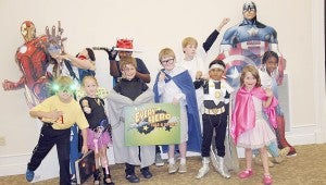 Messenger photo/Jaine Treadwell The Troy Public Library Superheroes gathered at the library Thursday and participated in costume contest and shared the stories of their super powers with other superheroes. Pictured from left, front, Owen Fleming, Alaina Bateman, James Thompson, Kelton Coppage, Aadi Patel and Lillian Thompson. Back, Tessa Suell, Carl Knight, Hunter Coppage and Carmen Wilson.