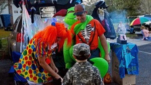 MESSENGER PHOTO/COURTNEY PATTERSON Park Memorial United Methodist Church and St. Martin of Tours Catholic Church held Trunk or Treat Wednesday. Children of all ages gathered and ventured through the parking lots of both church, visiting cars to “trunk or treat.”