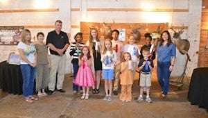 SUBMITTED PHOTO The Johnson Center or the Arts held the first Wildlife Expo on Oct. 24. The JCA recognized winners, awarding a Best of Show in each grade division and also a first, second and third place winner. Pictured above are all the winners. 