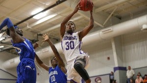 PHOTO/CHIP DILLARD The Goshen High School boys basketball team defeated Highland Home 78-30 Friday night.