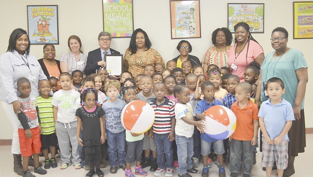 Brundidge Mayor Jimmy Ramage presented a proclamation to Brundidge Head Start Wednesday declaring the week of April 11-15 the Week of the Young Child in Brundidge. Pictured with the children are Ramage, Harriet McFarlin, Head Start director; Wanda Moultry, OCAP executive director; Rachel Smith, pre-K teacher; Shayna Rodgers, pre-K aide; Annie Fenn, substitute/aide; ShaQuria Wood, teacher; and Tracy Upshaw, site manager.