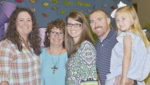 Deedie Hobbs Carter, second from left, received the Caregiver of the Year Award for her efforts to care for her late husband Kenneth Carter and her family during his fight against cancer. She was nominated by her daughters and is pictured with them. From left are Kasee Mann, Carter, Andrea Maness, Alan Maness and Emma Maness. Not pictured is Hunter Mann.