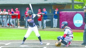 Photo/mike Hensley Lucas Brown pitched eight innings and Trevor Davis hit a two-run home run in the eighth inning to defeat in-state rival and 23rd ranked South Alabama on Friday night. Above: Cameron Sanders digs in at the plate. Inset: Brown throws a pitch against South Alabama. 