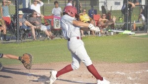submitted Photo/josh dutton Drew Nelson leads off the Dixie Youth Ozone West District 9 championship game against Andalusia with solo home run. Troy defeated Andalusia 17-1 to grab the championship.