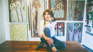 submitted Photo/ Former Trojan, Mary Ann Casey, is again exhibiting at the Johnson Center for the Arts. Her exhibit, “Totems and Stories,” focuses on the connection of places, people and times.