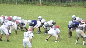 Photo/mike hensley There is a little over a week remaining until the crosstown rivals Pike County and Charles Henderson meet to kick off the 2016 football season. On Wednesday afternoon the Bulldogs battled raining conditions during their practice that consisted of special team and 11-and-11 work. The Bulldogs and the Trojans will kick things off at 7 p.m. on August 19 at Bulldogs Stadium in Brundidge. 