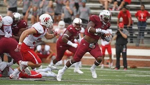 Troy running back Jordan Chunn (38) runs for a 48-yard touchdown during the first half of NCAA college football game against Austin Peay in Troy, Ala., Saturday, Sept. 3, 2016. (Photo/Thomas Graning)