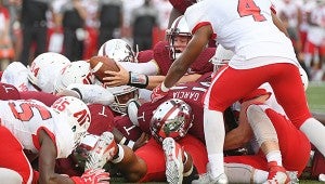 Troy quarterback Brandon Silvers (12) reaches across the goal line for a 1-yard touchdown dive during the first half of NCAA college football game against Austin Peay in Troy, Ala., Saturday, Sept. 3, 2016. (Photo/Thomas Graning)