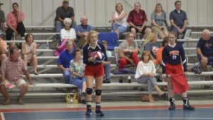 Messenger Photo/mike hensley Mya Terry gets set to serve during a match with Emmanuel Christian on Tuesday night. Terry and the Patriots fell to the Warriors in straight sets 19-25, 16-25, 15-25.