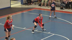 Photo/Mike Hensley Mya Terry (left) and Lauren Johnson (right) of Pike Liberal Arts, get tready to defend a Morgan serve on Tuesday afternoon. The Patriots fell to the Senators in straight sets.