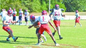 Messenger Photo/mike hensley The Pike Patriots welcome in the Hooper Colts Friday night with a shot at the playoffs on the line