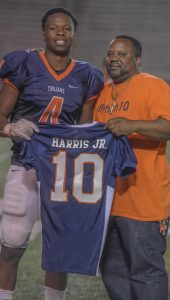 Messenger photo/jonah enfinger The Charles Henderson Trojans honored alumni on Friday night in the first ever Legacy Game. At the end of the game players presented alumni with their number and jersey.