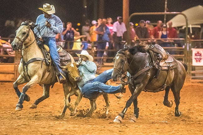 Local cowboys compete for mechanical bull championship - The Troy Messenger